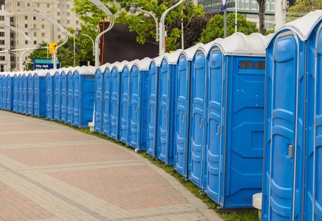 a row of portable restrooms at a fairground, offering visitors a clean and hassle-free experience in Coral Gables